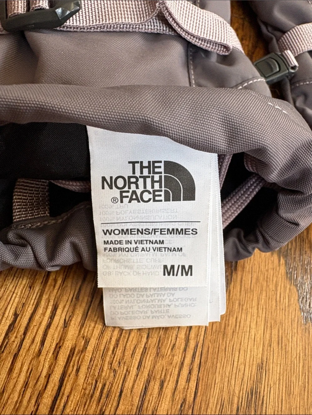 The North Face purple-grey women’s adjustable ski gloves. Excellent condition